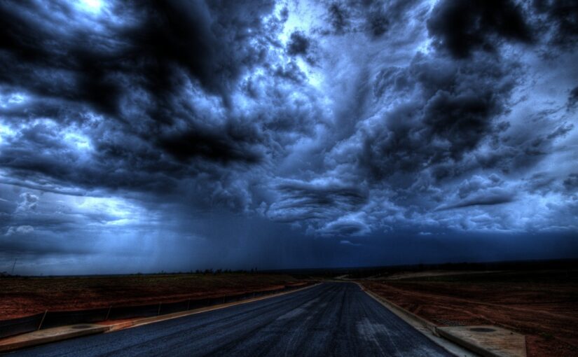 road under cloudy sky