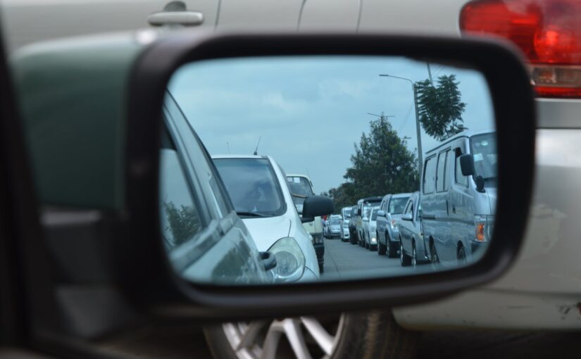 car side mirror showing heavy traffic