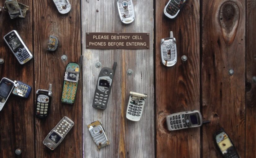 antique broken cell phone communication